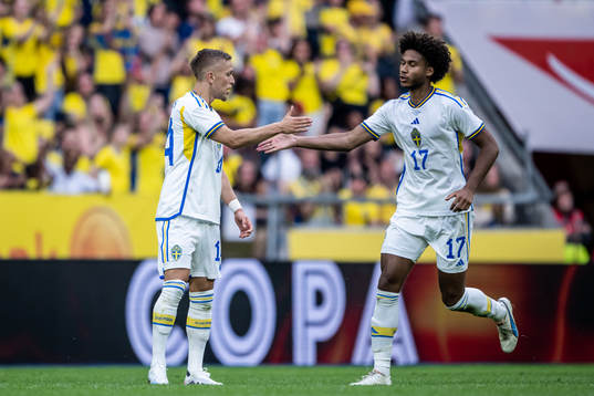 Jesper Karlsson and Jens Cajuste of Sweden celebrate