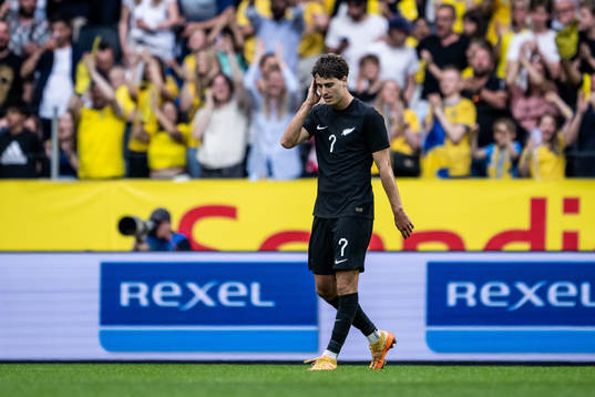 Matt Garbett of New Zealand looks dejected