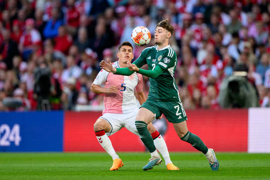 Joakim Mæhle of Denmark and Conor Bradley of Northern