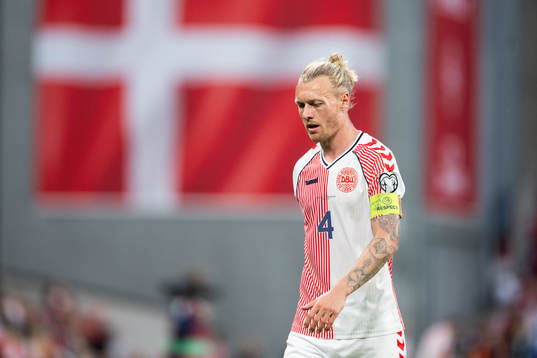Simon Kjær of Denmark looks dejected