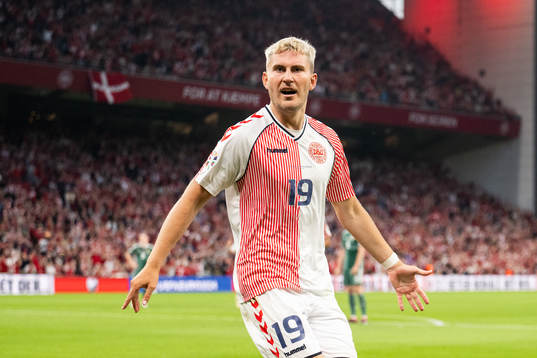 Jonas Wind of Denmark celebrates