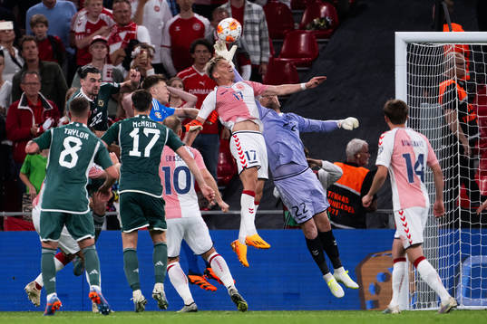 Goalkeeper Kasper Schmeichel and Jens Stryger of Denmark