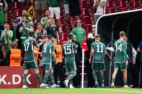 Players of Northern Ireland look dejected afte the UEFA