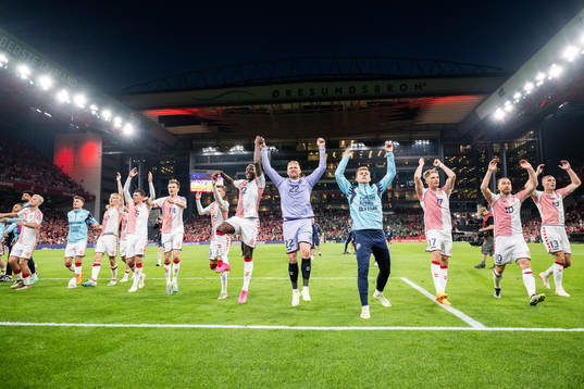 Players of Denmark celebrate