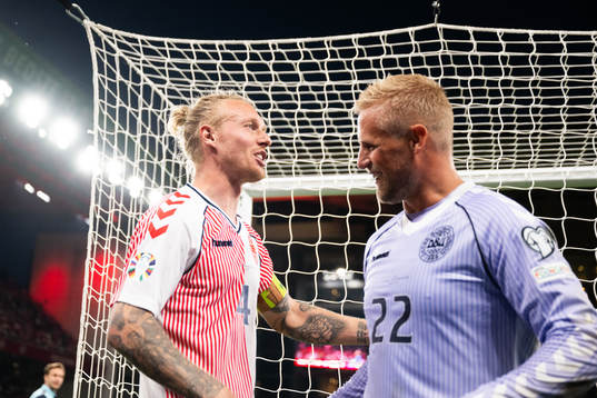 Simon Kjær and Goalkeeper Kasper Schmeichel of Denmark