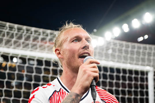 Simon Kjær of Denmark celebrates