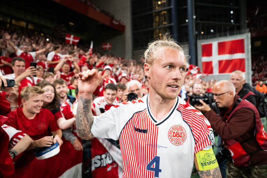Simon Kjær of Denmark celebrates