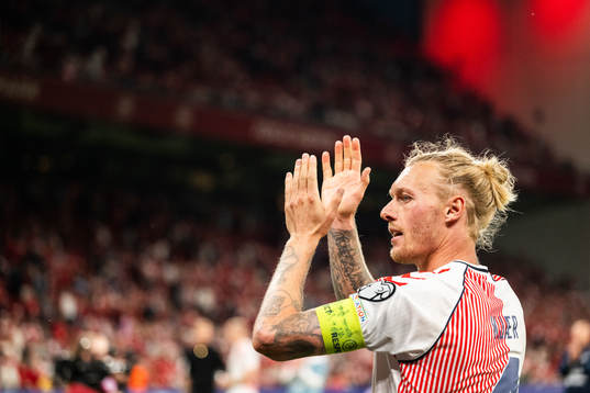 Simon Kjær of Denmark celebrates
