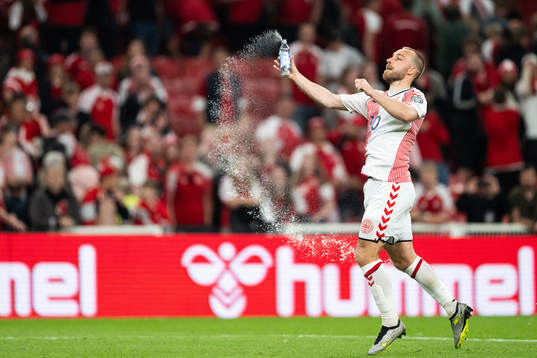 Christian Eriksen of Denmark celebrates