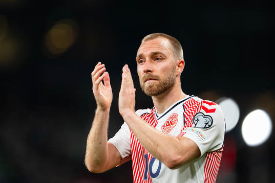 Christian Eriksen of Denmark celebrates