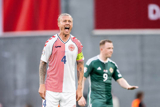 Simon Kjær of Denmark reacts