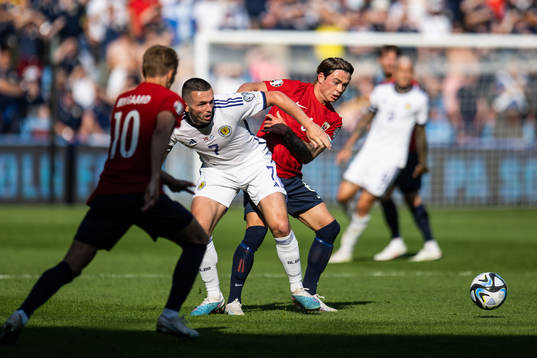 John McGinn of Scotland and Patrick Berg of Norway