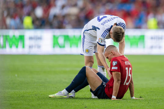 Stuart Armstrong of Scotland and Leo Skiri Østigård of