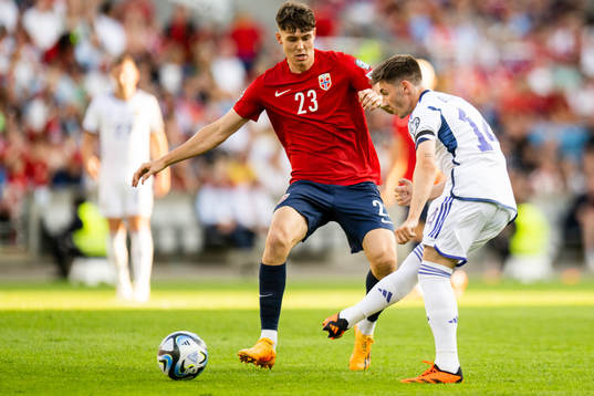 Jørgen Strand Larsen of Norway and Billy Gilmour of