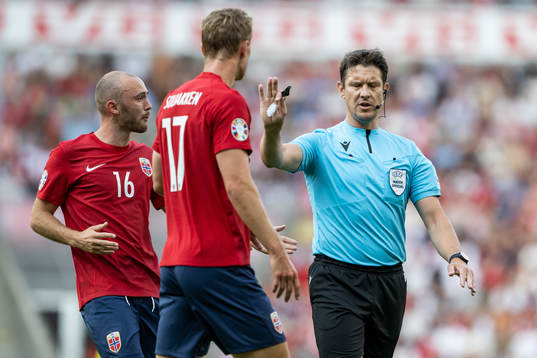 Fredrik Aursnes of Norway and Referee Matej Jug