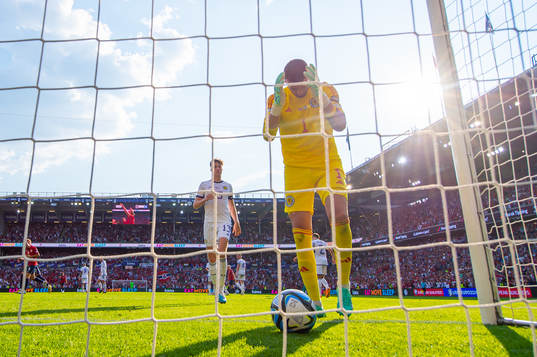 Goalkeeper Angus Gunn of Scotland looks dejected