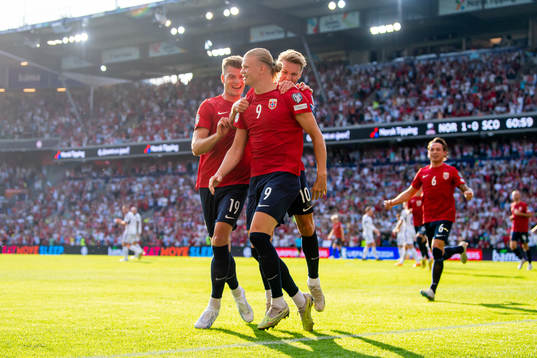 Erling Braut Haaland of Norway celebrates with teammates