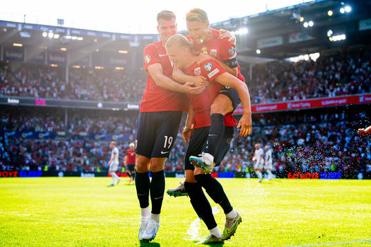 Erling Braut Haaland of Norway celebrates with teammates