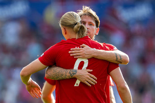 Erling Braut Haaland of Norway celebrates with teammate