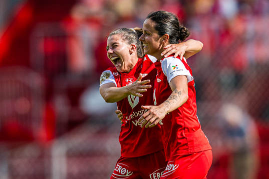 Amanda Paige Frisbie of Brann celebrates