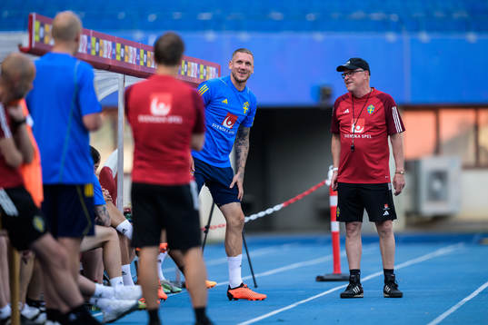 Goalkeeper Robin Olsen and head coach Janne Andersson of