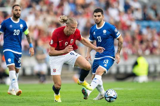 Erling Braut Haaland of Norway and Ioannis Kousoulos of