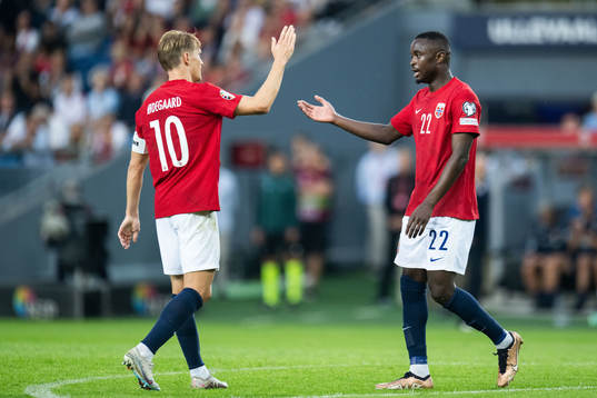 Martin Ødegaard and Brice Wembangomo of Norway