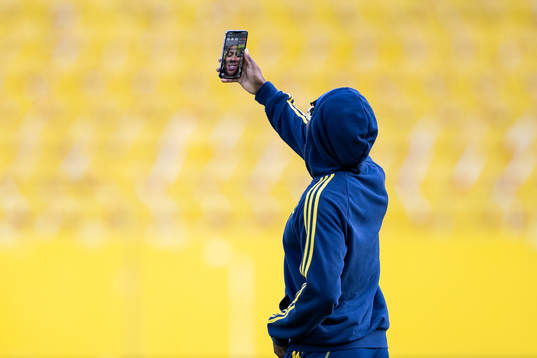 Anthony Elanga of Sweden facetiming with his girlfriend
