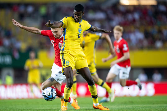 Stefan Posch of Austria and Alexander Isak of Sweden