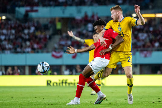 Junior Adamu of Austria and Dejan Kulusevski of Sweden