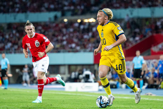 Patrick Wimmer of Austria and Emil Forsberg of Sweden