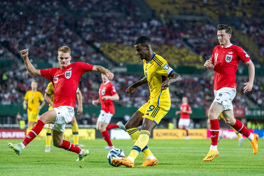 Philipp Lienhart and Michael Gregoritsch of Austria against