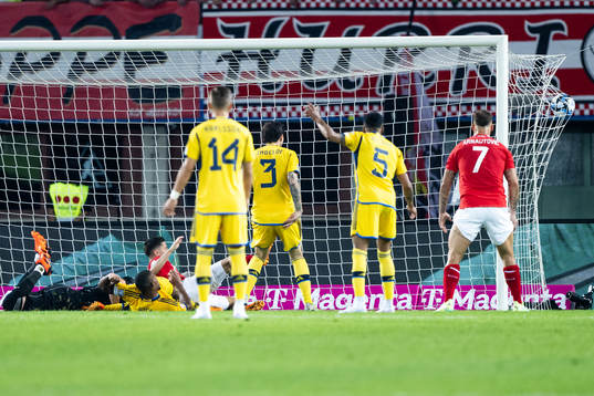 Christoph Baumgartner of Austria scores 1-0