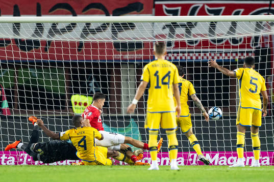 Christoph Baumgartner of Austria scores 1-0