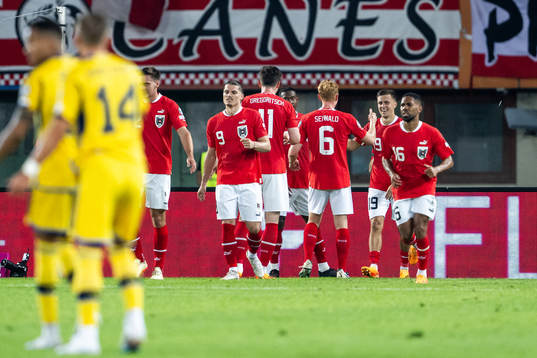 Christoph Baumgartner of Austria celebrates with team