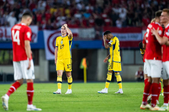 Viktor Gyökeres and Martin Olsson of Sweden looks dejected