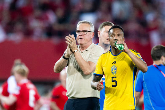 Head coach Janne Andersson and Martin Olsson of Sweden