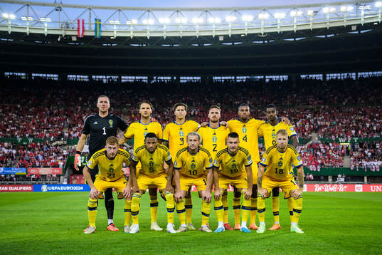 The starting eleven players of Sweden pose