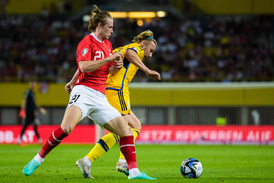 Patrick Wimmer of Austria and Emil Forsberg of Sweden