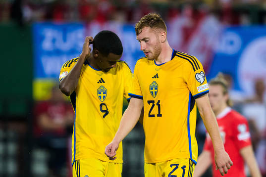 Alexander Isak and Dejan Kulusevski of Sweden look dejected