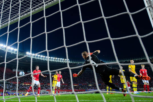 Michael Gregoritsch of Austria attacks in front of