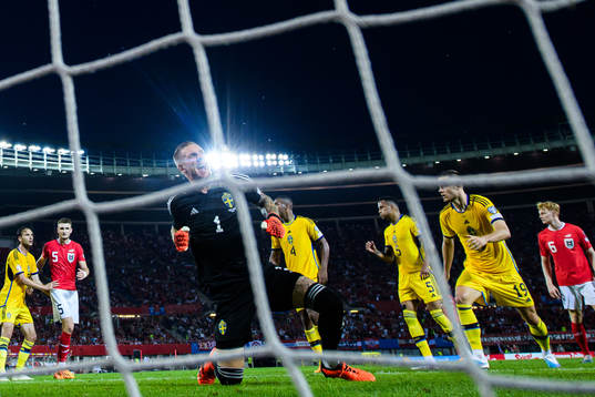 Goalkeeper Robin Olsen of Sweden celebrates