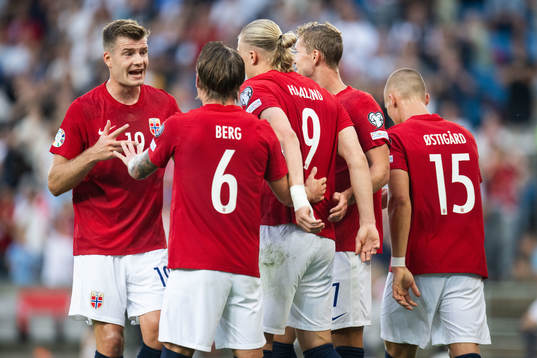 Erling Braut Haaland of Norway celebrates with team mates
