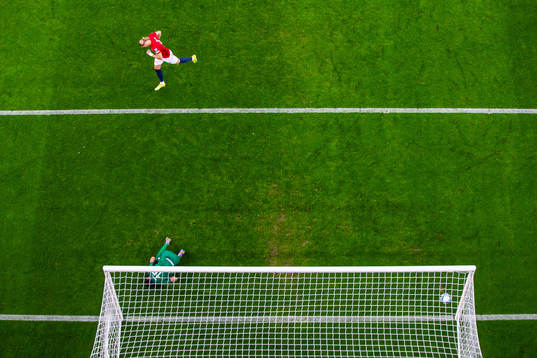 Erling Braut Haaland of Norway scores the 2-0 goal behind