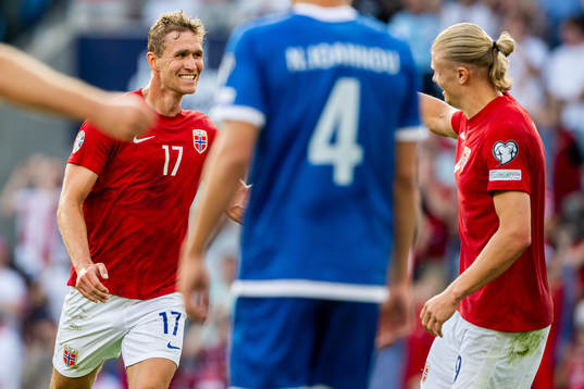 Ola Solbakken of Norway celebrates with Erling Braut Haaland