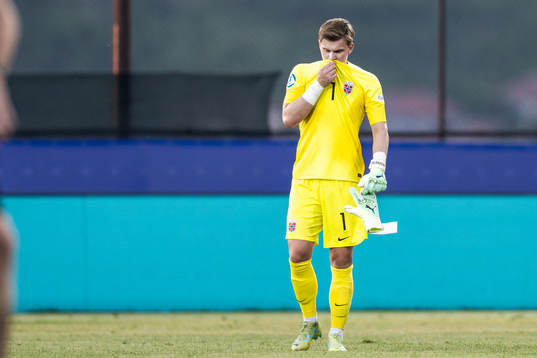 Goalkeeper Mads Hedenstad Christiansen of Norway looks