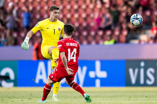 Goalkeeper Mads Hedenstad Christiansen of Norway and Matteo