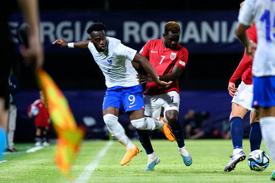 Arnaud Kalimuendo Muinga of France and Joshua Kitolano of