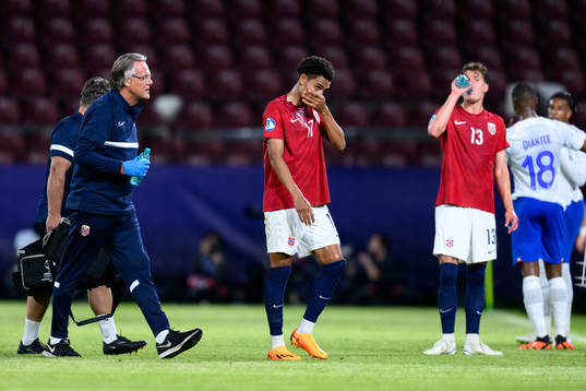 Antonio Nusa of Norway receives medical attention