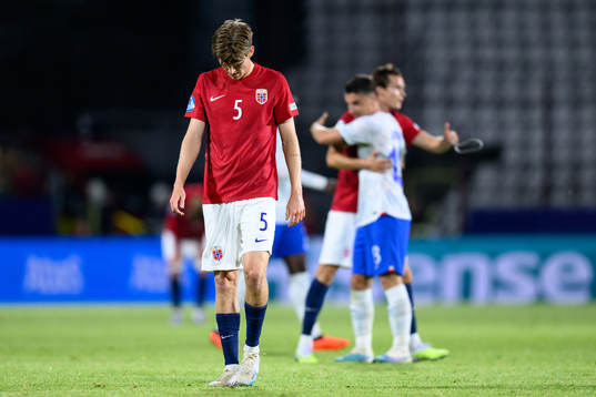 David Møller Wolfe of Norway looks dejected